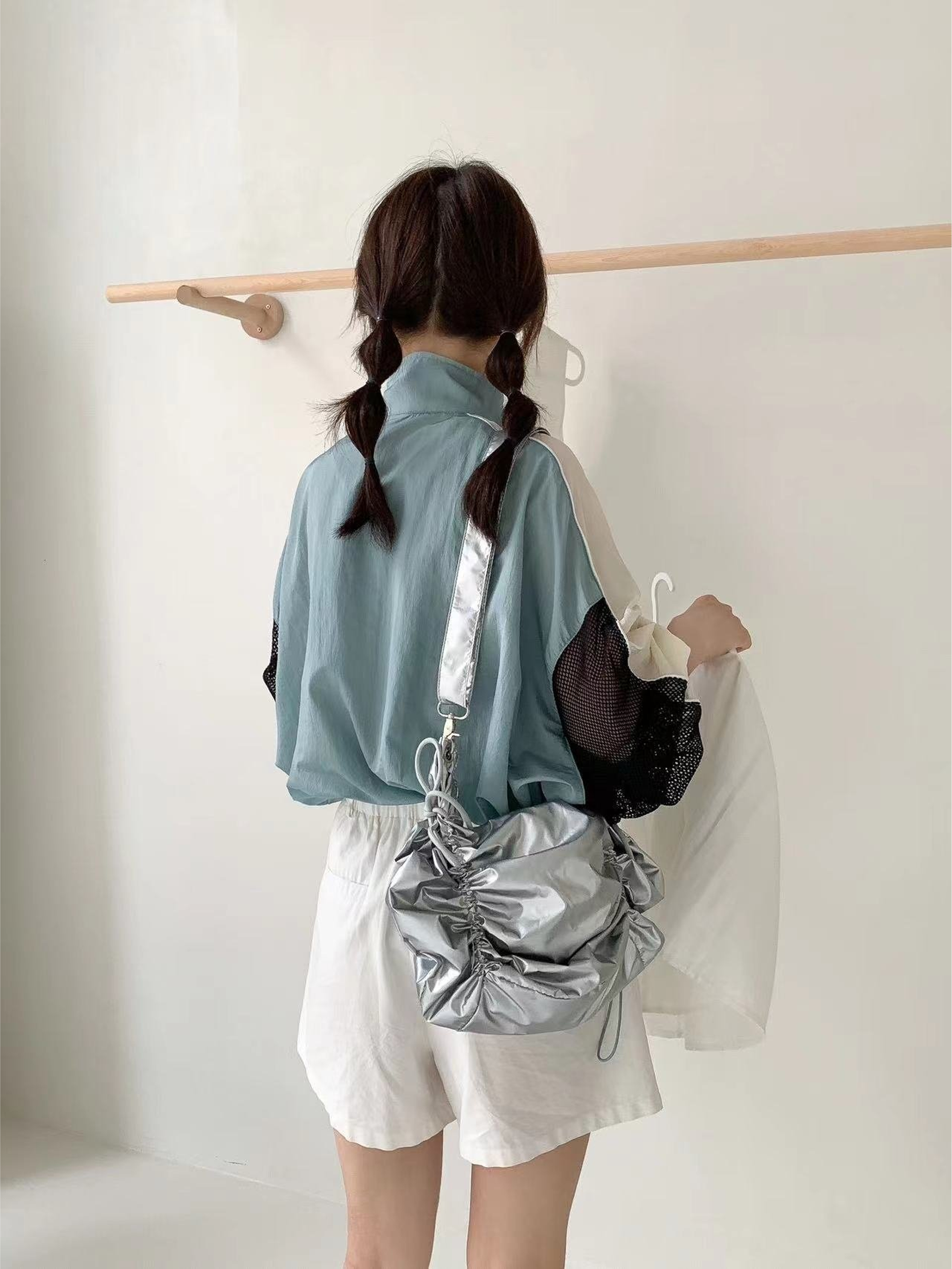 Woman shirring bag